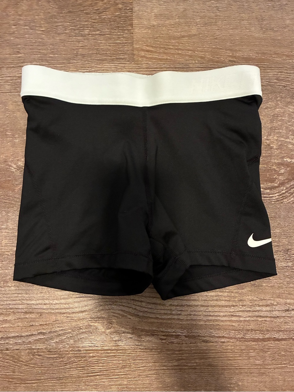 Nike black and light blue nike pros